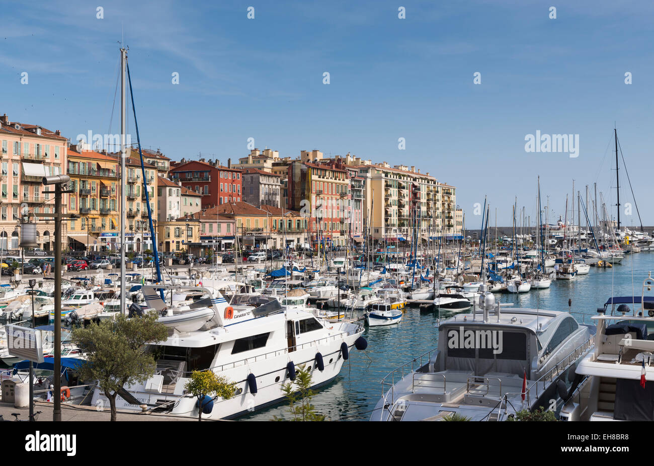 French Riviera - Luxury yachts and boats moored in the old harbour at Nice, Provence, France in the summer Stock Photo