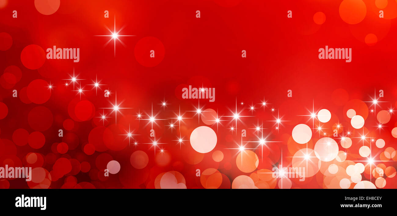 Festive sparkling lights. Shiny red background in starlight and sparkles Stock Photo