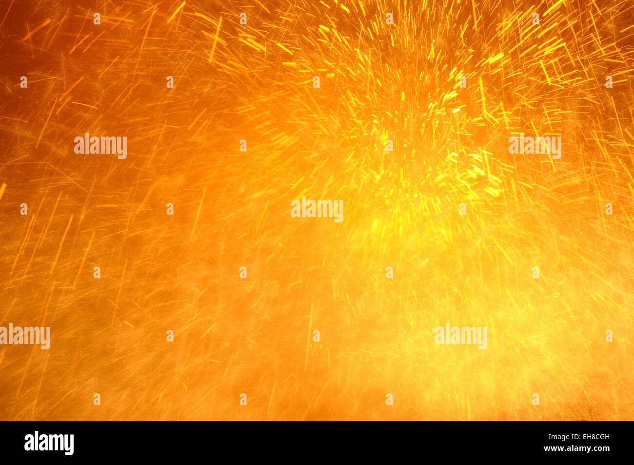 Golden Yellow Fire Spark Background Stock Photo