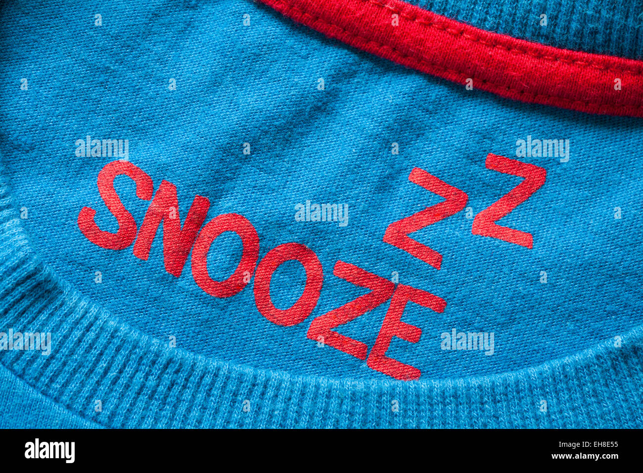 Z Z snooze ZZ stamped in child's top garment, part of pyjamas set Stock Photo