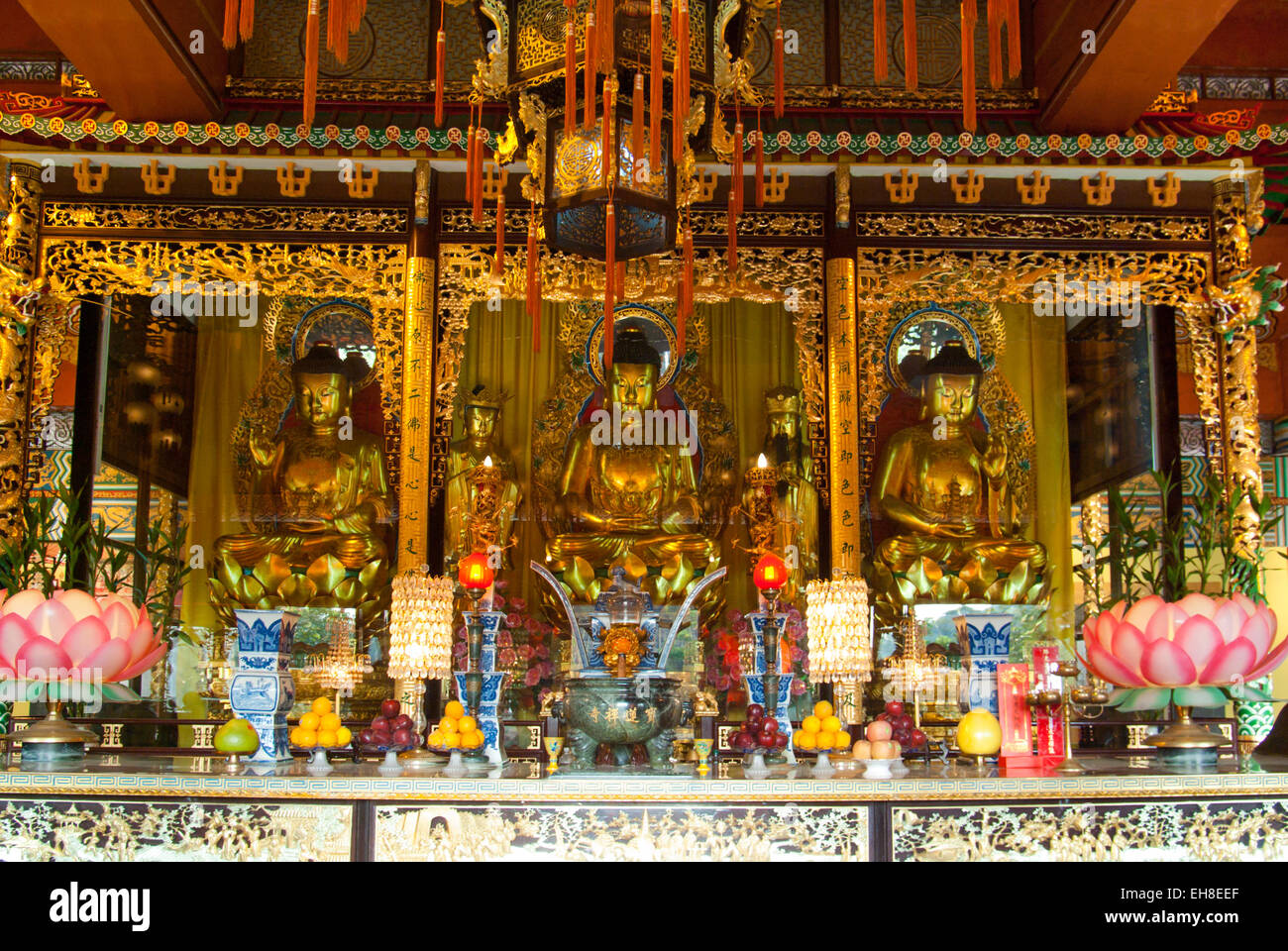 Altar in Chinese Buddhist Po Lin Temple on Lantau Island, Hong Kong Stock Photo