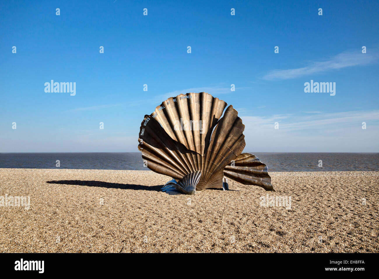 Aldeburgh, Suffolk, UK. Scallop, a steel sculpture (2003) by Maggi Hambling dedicated to the composer Benjamin Britten Stock Photo