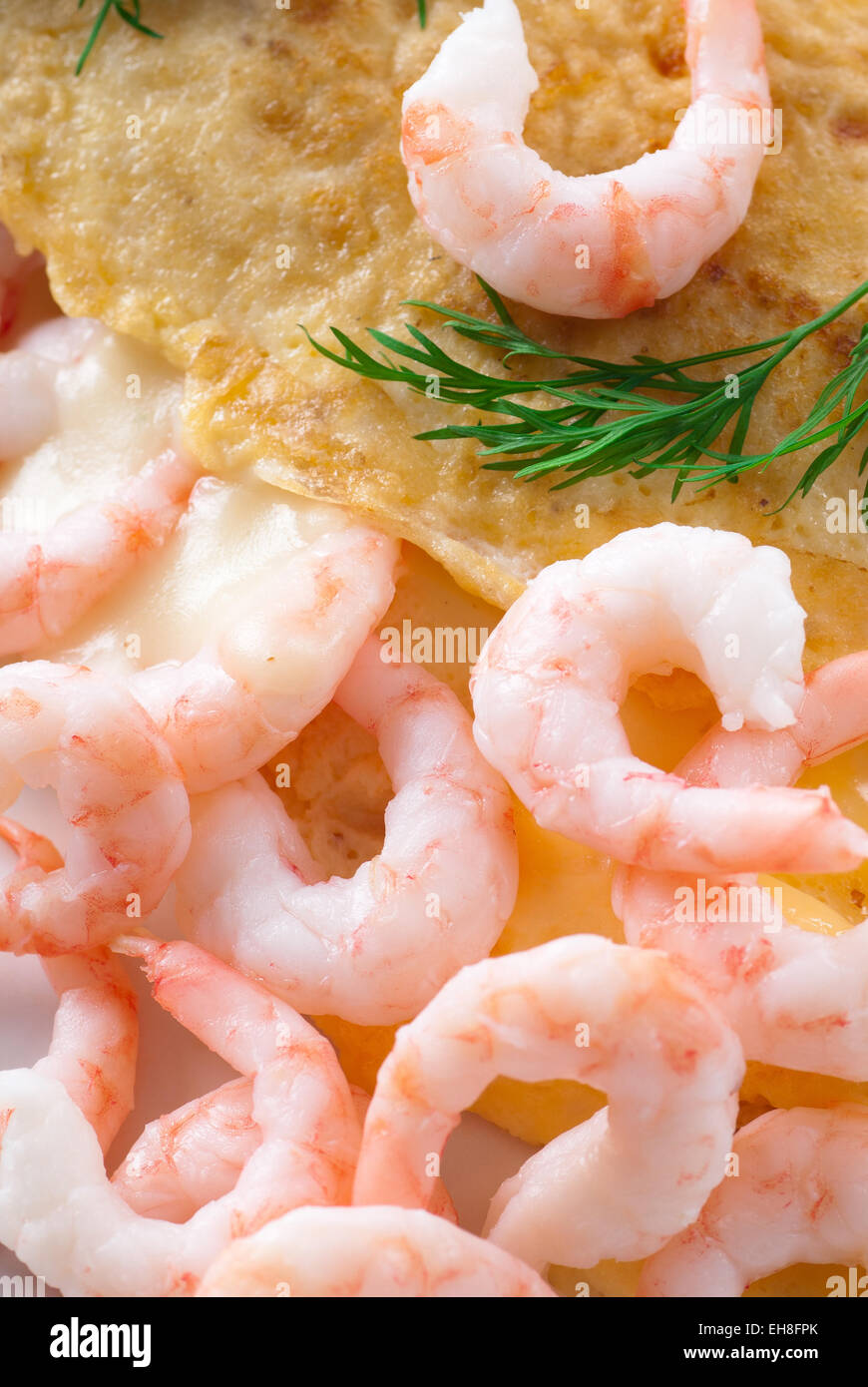 Omelet with shrimps and dill. Stock Photo