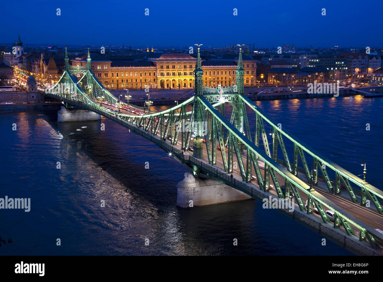 Liberty Bridge (also known as Freedom Bridge and Szabadság hid) spanning the river Danube, Budapest, Hungary.  Taken at dusk. Stock Photo