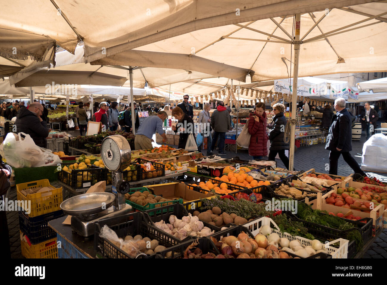 Campo De' Fiori traditional Roman market with people shopping for food
