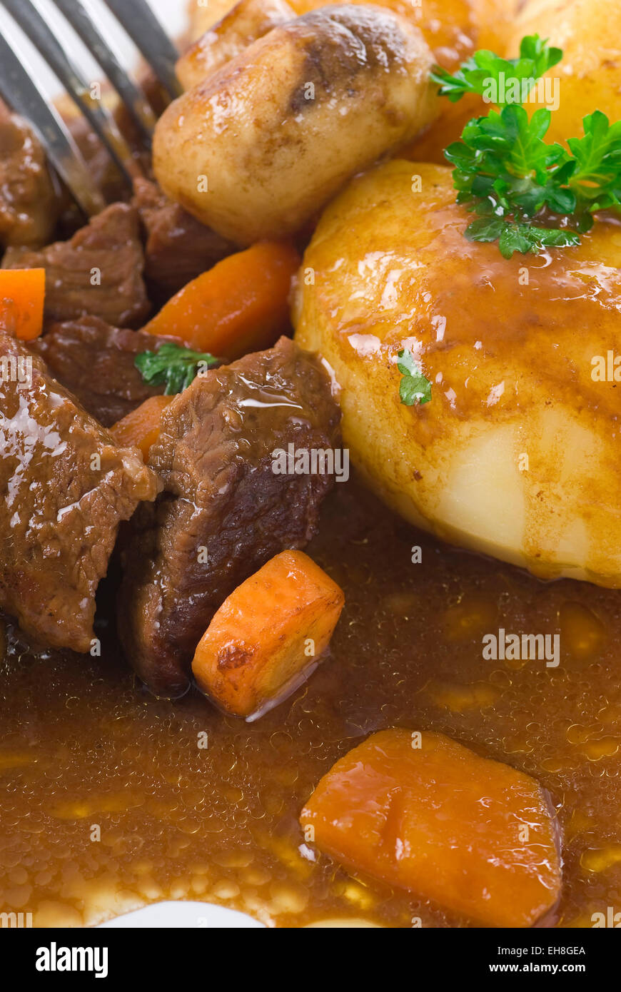 Meat and vegetable casserole with potato. Stock Photo