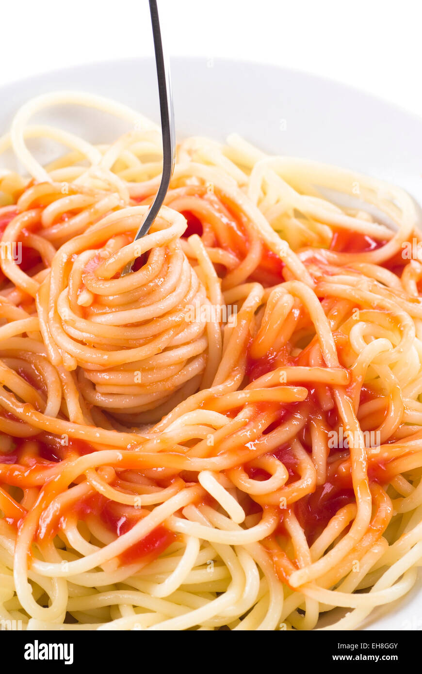Spaghetti with ketchup in a bowl. Stock Photo