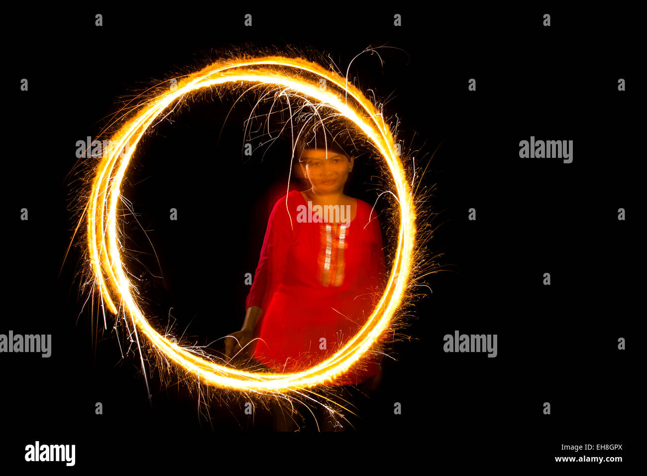 1 indian Adult Woman Housewife diwali Burning Fire Crackers enjoy Stock Photo