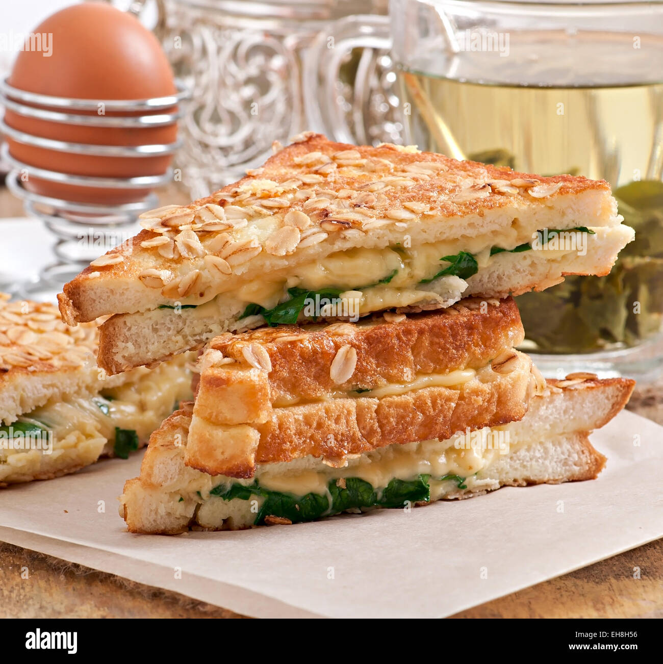 Warm toast with cheese and spinach for breakfast Stock Photo Alamy