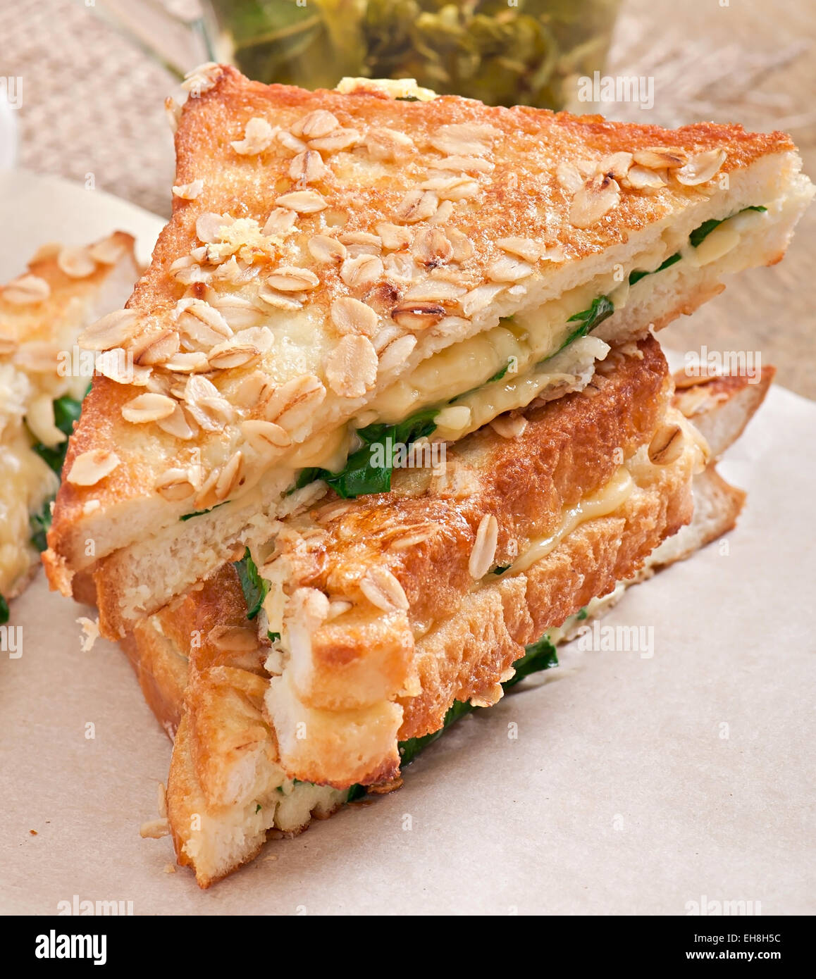 Warm toast with cheese and spinach for breakfast Stock Photo Alamy