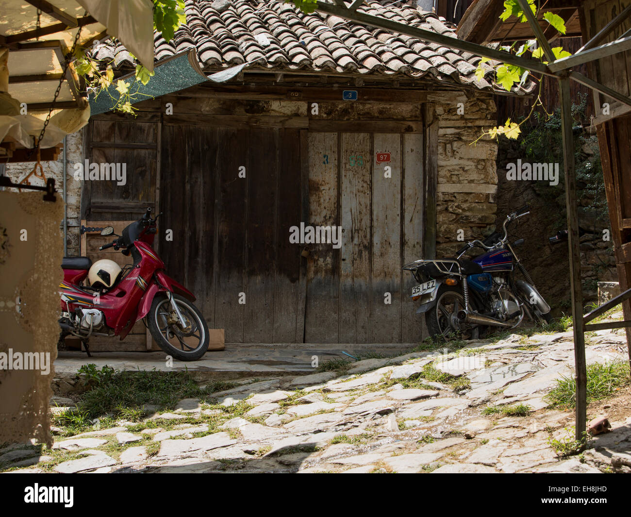 Sirince, Turkey motorcycles poor housing Stock Photo