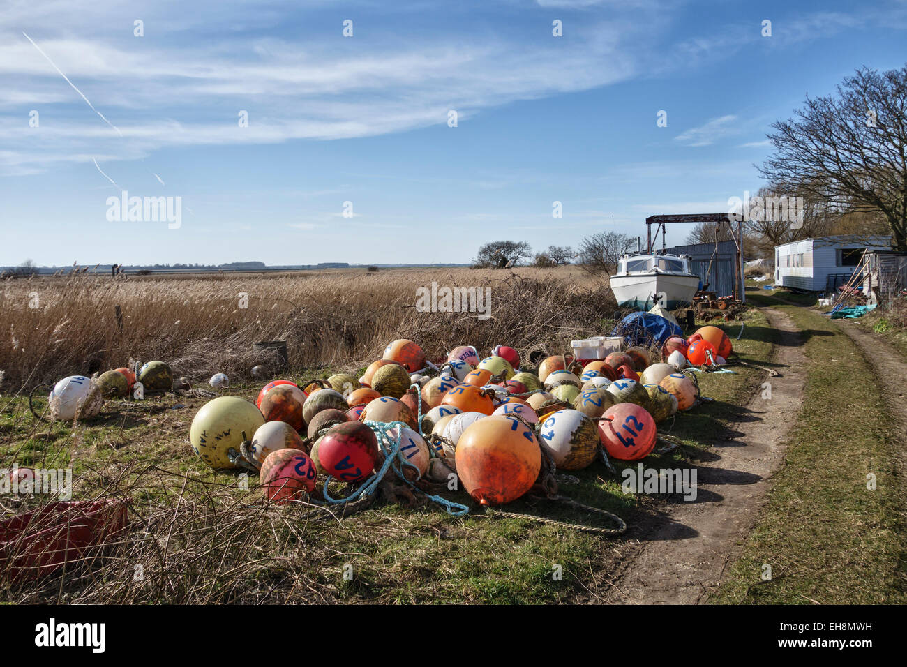 Aldeburgh, Suffolk, UK. Plastic fishing buoys and fenders Stock Photo -  Alamy