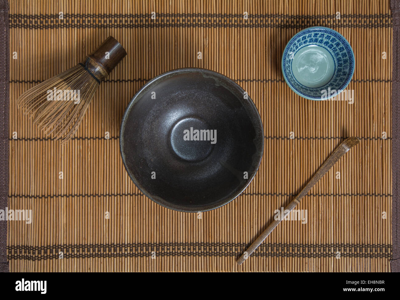 Matcha Bowl with a Chasen and a Chashaku on a place mat Stock Photo