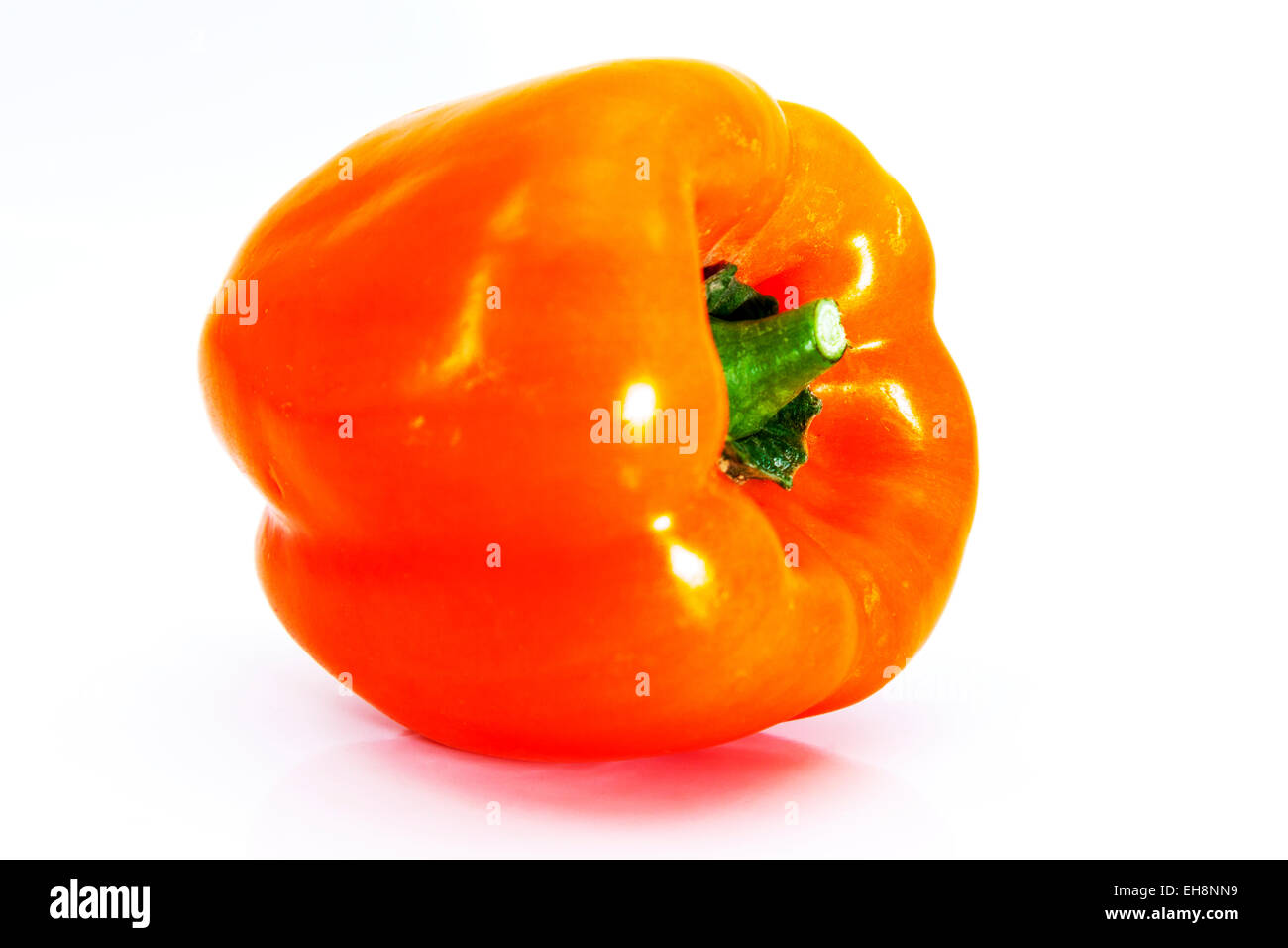 Red orange pepper whole vegetable food product cutout white background copy space isolated color colorful colour colourful day Stock Photo