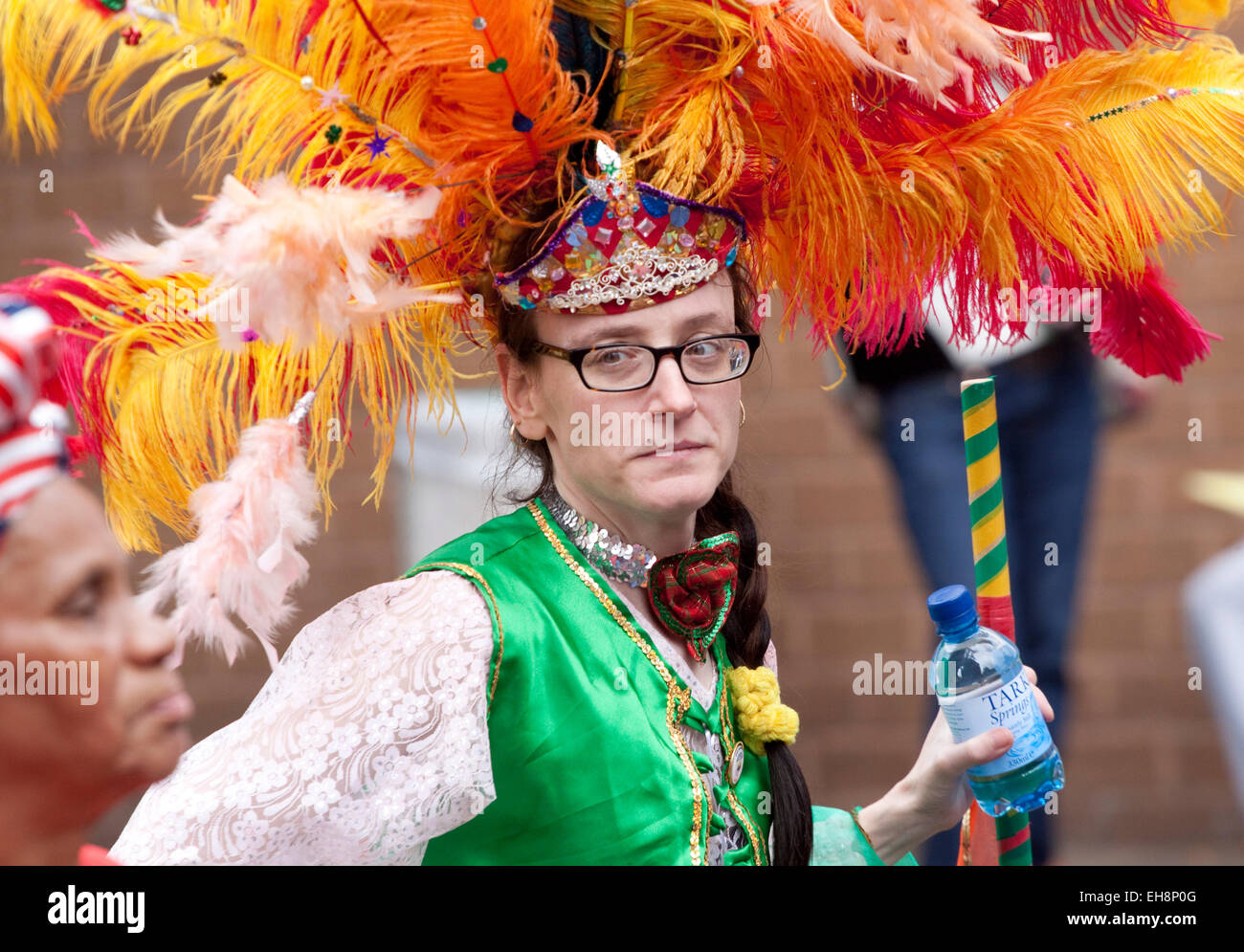 Orange feathered headdress hi-res stock photography and images - Alamy