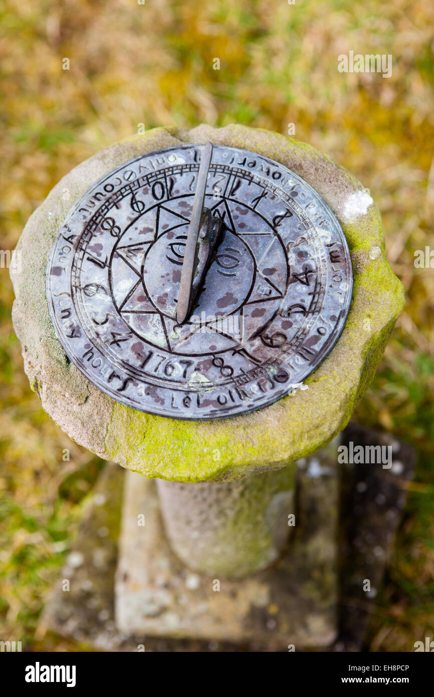 A rustic sundial Stock Photo Alamy