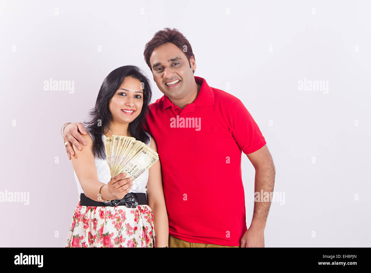 2 indian Seniors Married couples money showing Stock Photo - Alamy