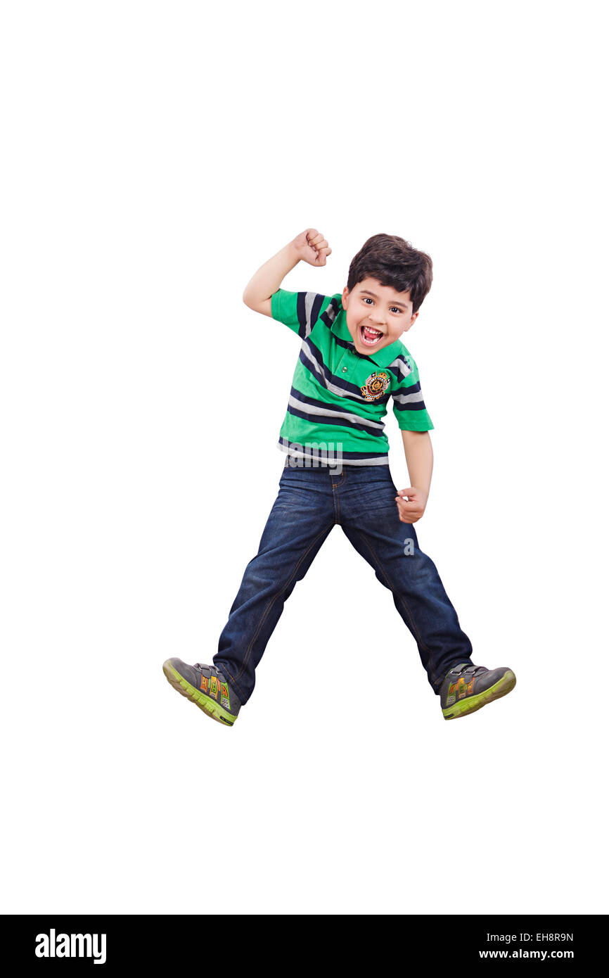 1 indian kid boy Jumping shouting fun Stock Photo