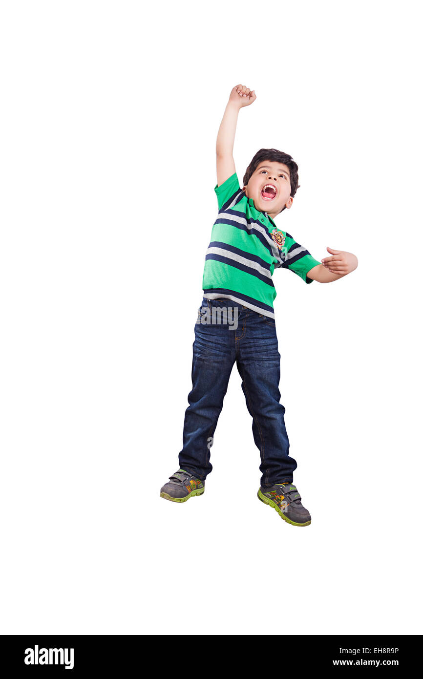 1 indian kid boy Jumping shouting fun Stock Photo