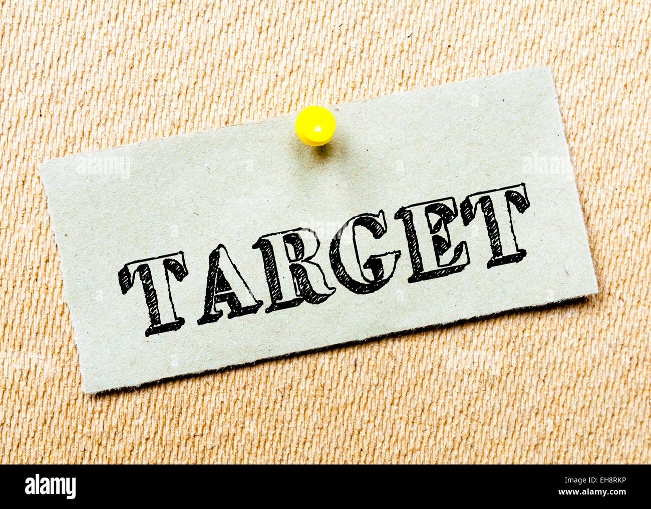 Recycled paper note pinned on cork board.Target Message. Concept Image