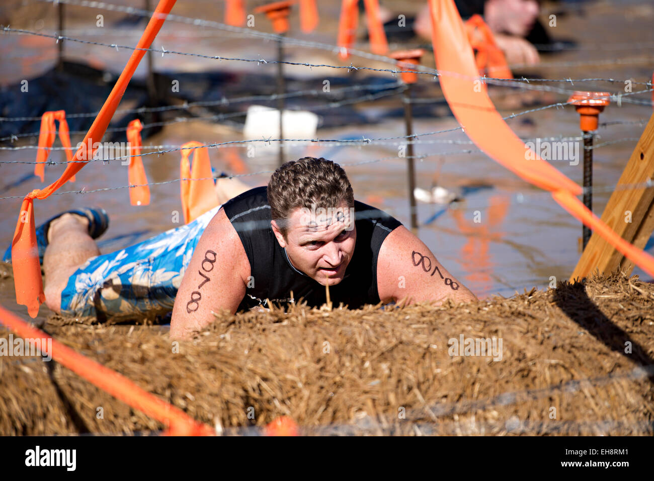 Man competes in the Tough Mudder event in Milton, Florida Stock Photo