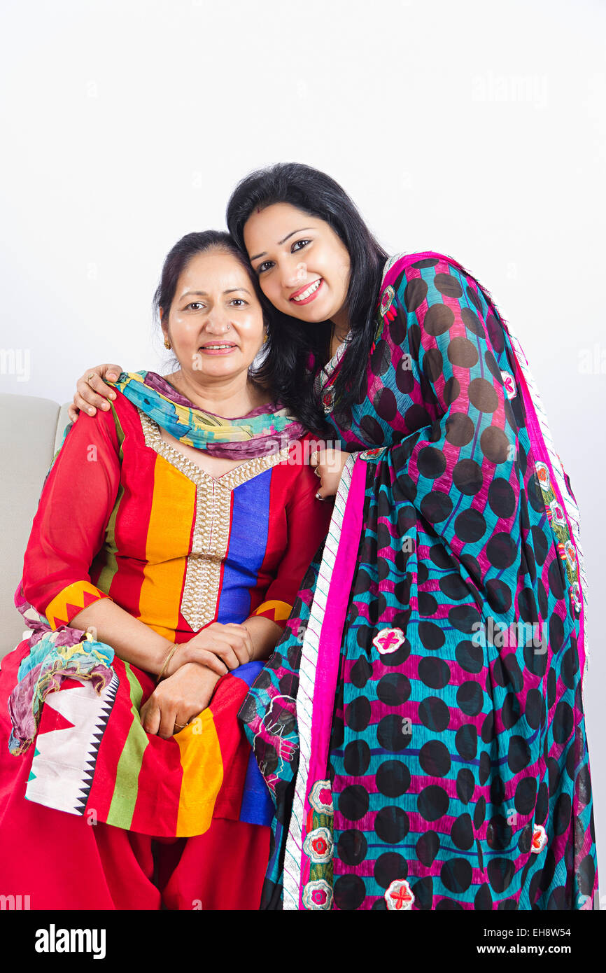2 indian Adults Only Mother and daughter Sitting sofa Stock Photo