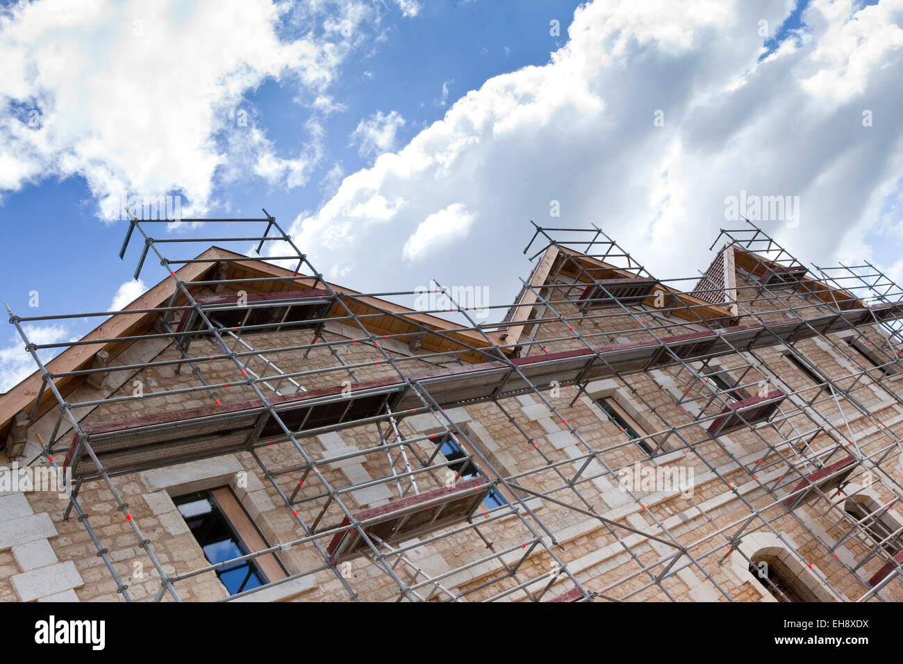Scaffolding and stoned building on a renovation site Stock Photo - Alamy