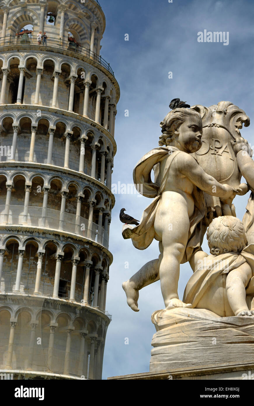 Leaning Tower of Pisa with statue, Pizza del Miracoli, Pisa, Italy Stock Photo