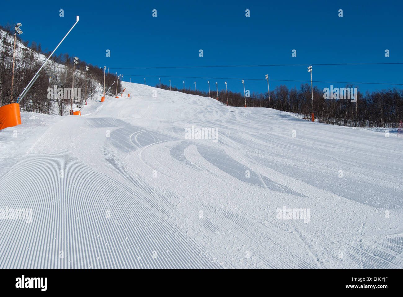 Freshly pisted red ski slope in Geilo, Norway Stock Photo
