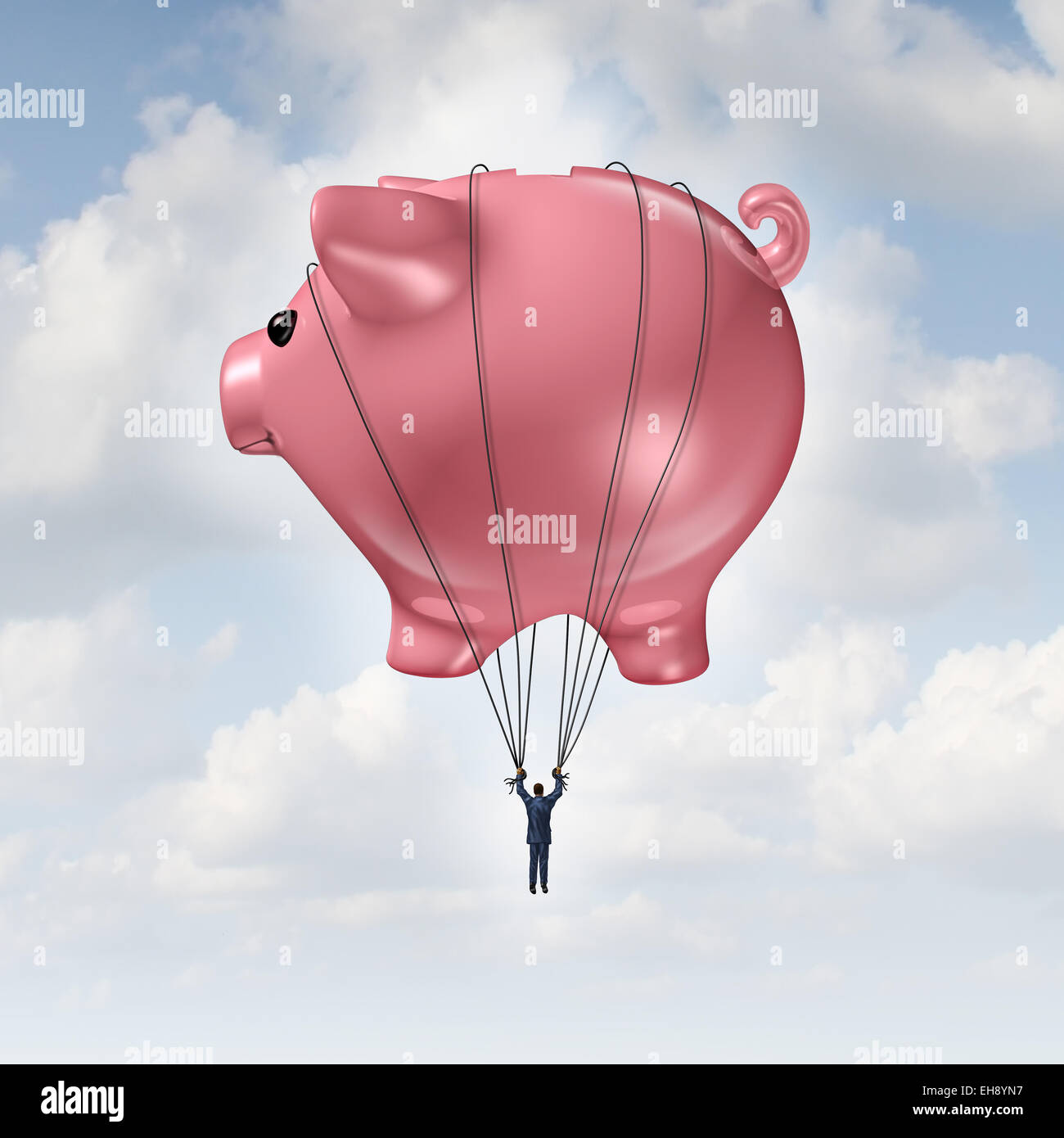Financial freedom concept as a piggy bank hot air balloon lifting a businessman up to success as a wealth management and investment advice metaphor. Stock Photo