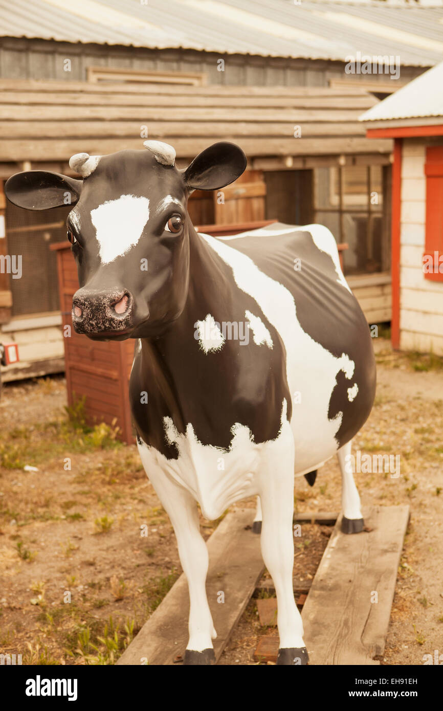 fake cow next to Feed Store, Half Moon Bay, California Stock Photo