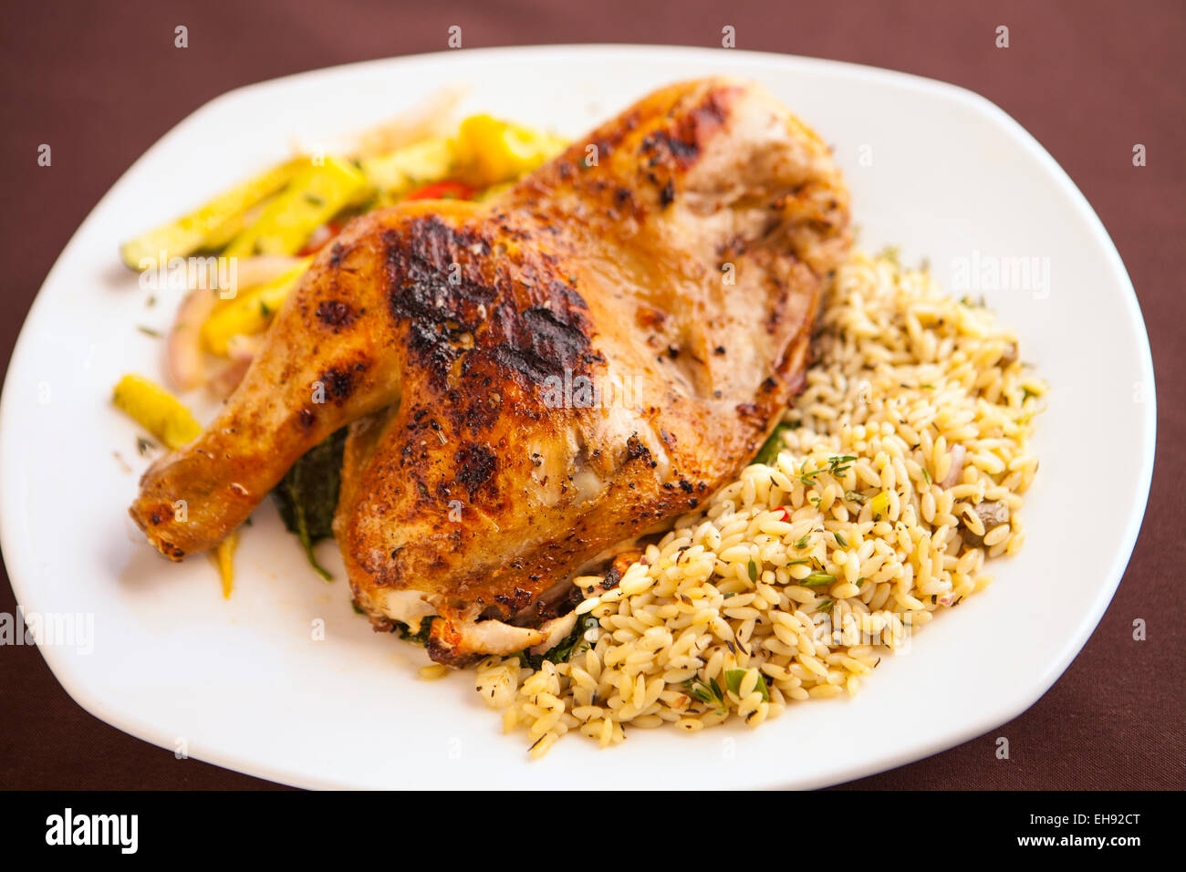 Grilled chicken thigh hires stock photography and images Alamy