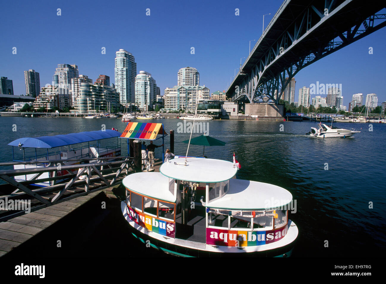 Aquabus Ferry / Water Taxi docked in False Creek at Granville Island, Vancouver, BC, British Columbia, Canada Stock Photo