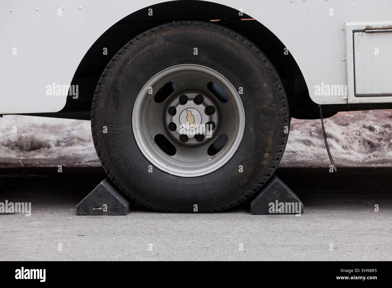 Wheel chocks placed under parked truck USA Stock Photo 79495113 Alamy