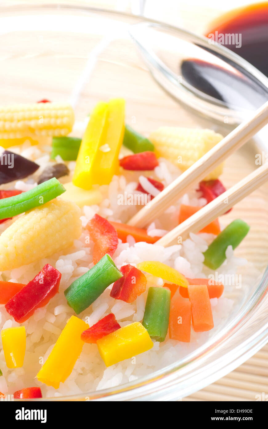 Rice with cooked vegetables and soy sauce. Stock Photo