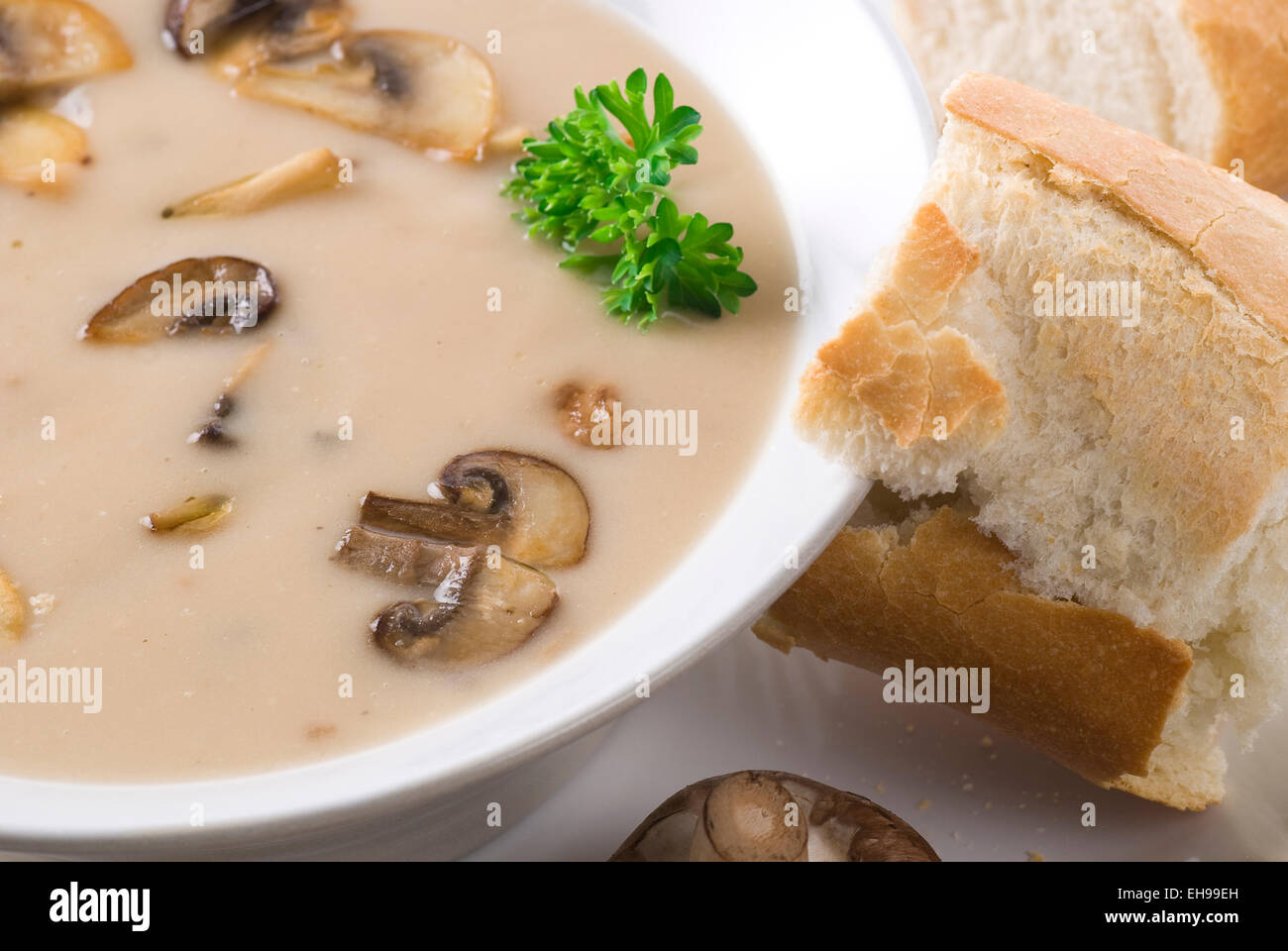 Mushroom soup with bread Stock Photo - Alamy