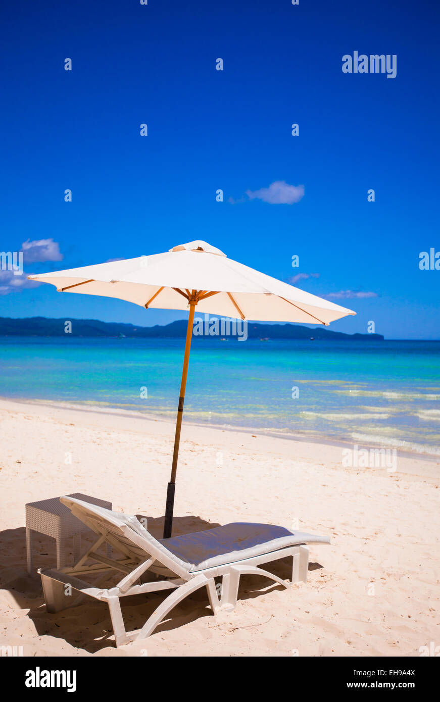 Beach chairs on perfect tropical white sand beach Stock Photo - Alamy