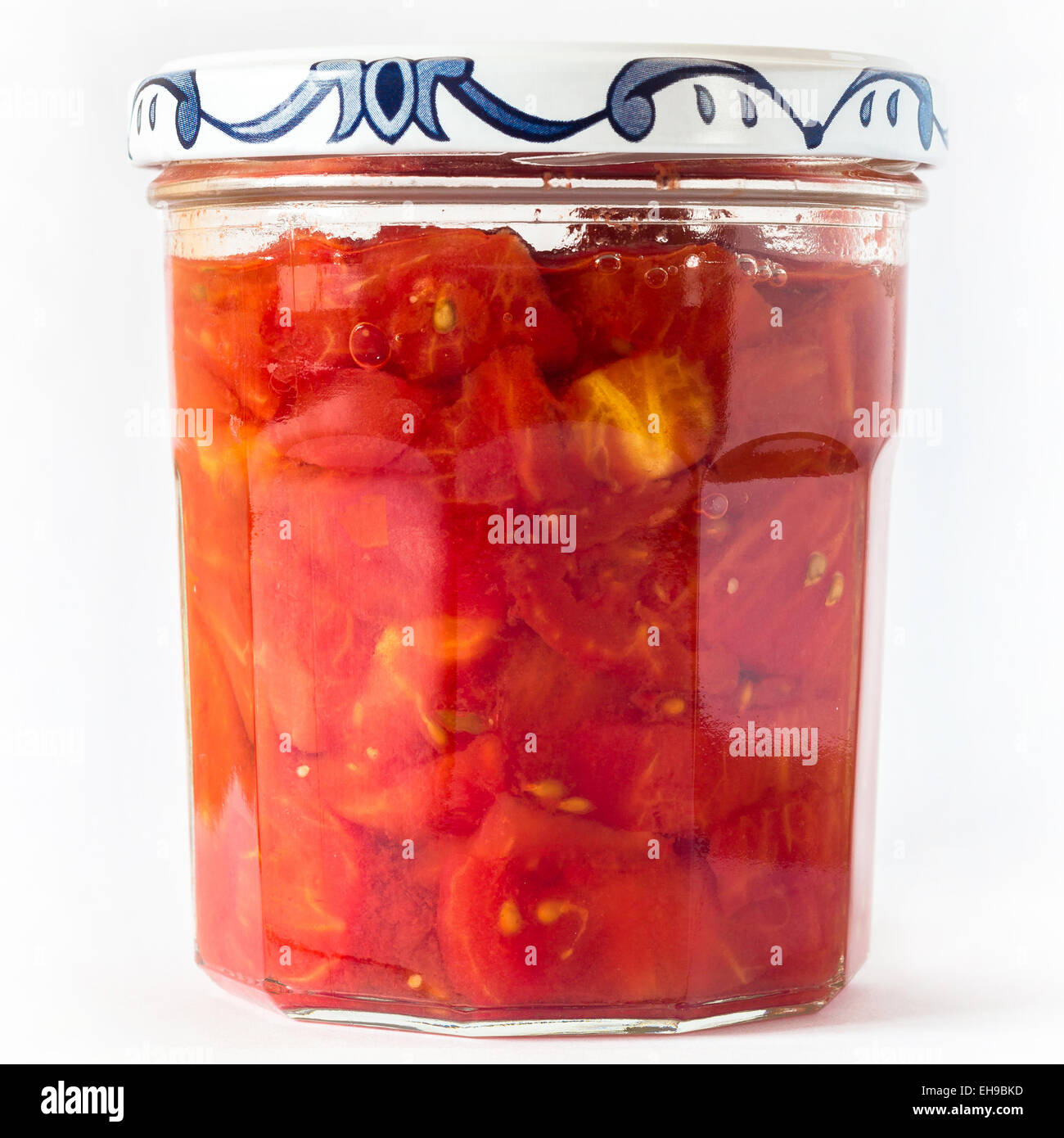 Chopped tomatoes cooked and preserved in jars Stock Photo Alamy