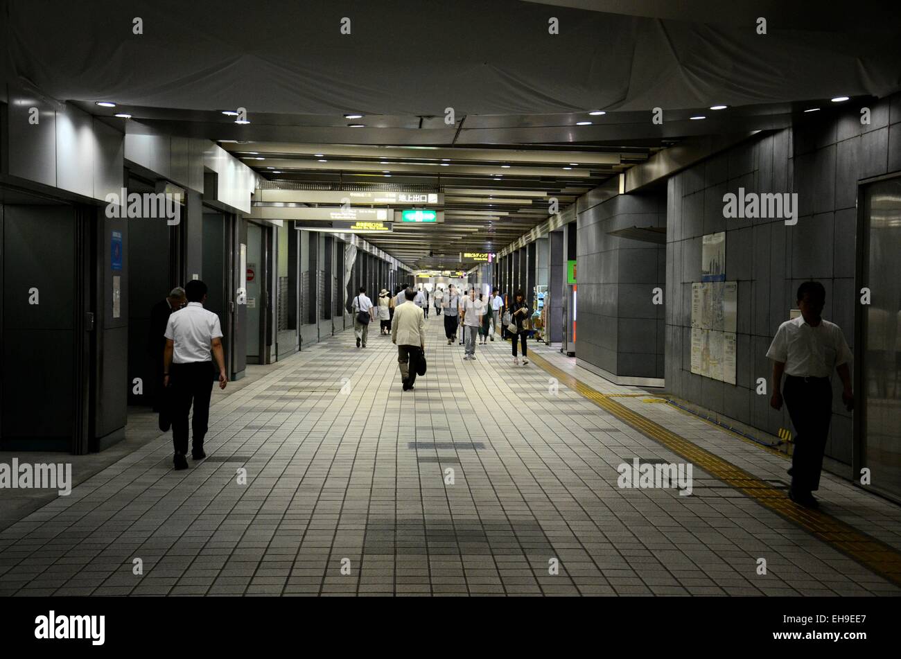 Pedestrians walk through underground tunnel at Shinjuku station Tokyo Japan Stock Photo Alamy