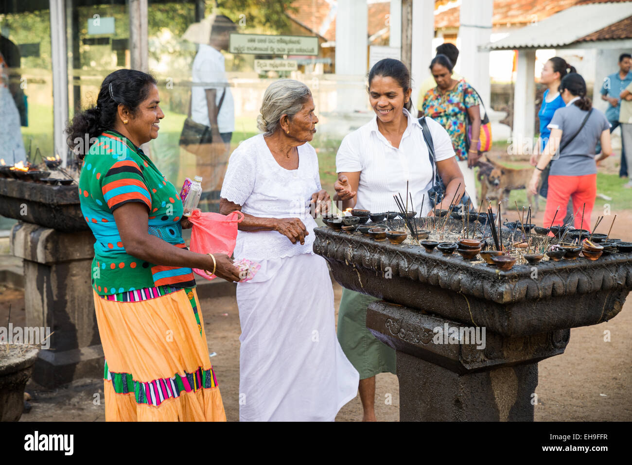 Pilgrims in the Ruvanvelisaya Dagoba, Anuradhapura ancient city, Sri Lanka, Asia Stock Photo