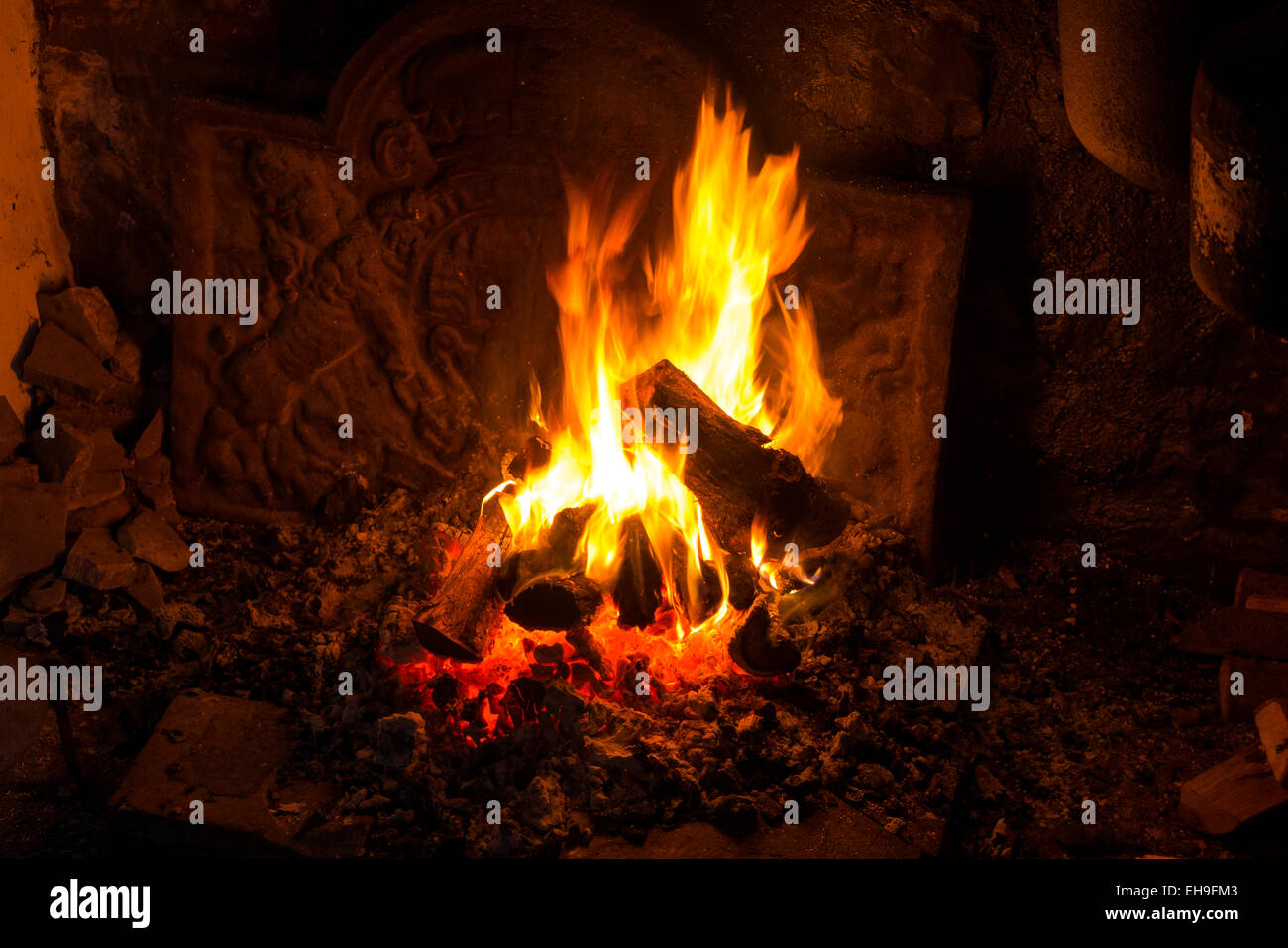 Open log fire St Fagans Cardiff South Wales Stock Photo Alamy