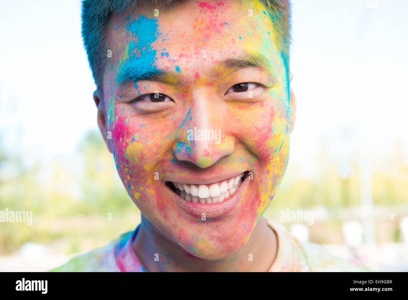Young man at The Color Run Stock Photo - Alamy