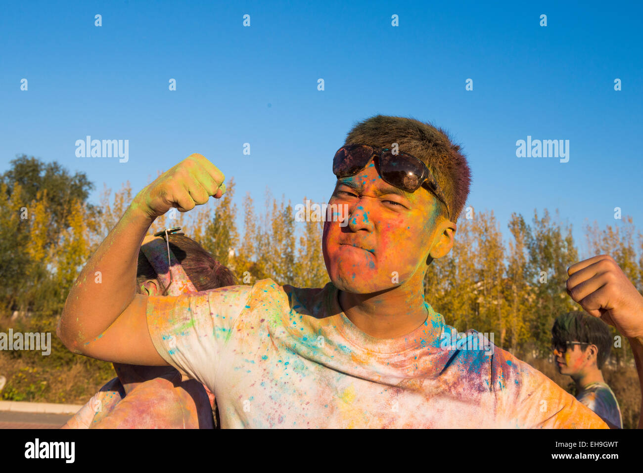 Young man at The Color Run Stock Photo - Alamy