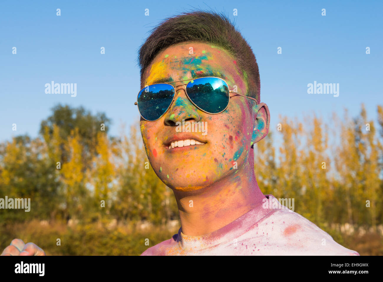 Young man at The Color Run Stock Photo - Alamy
