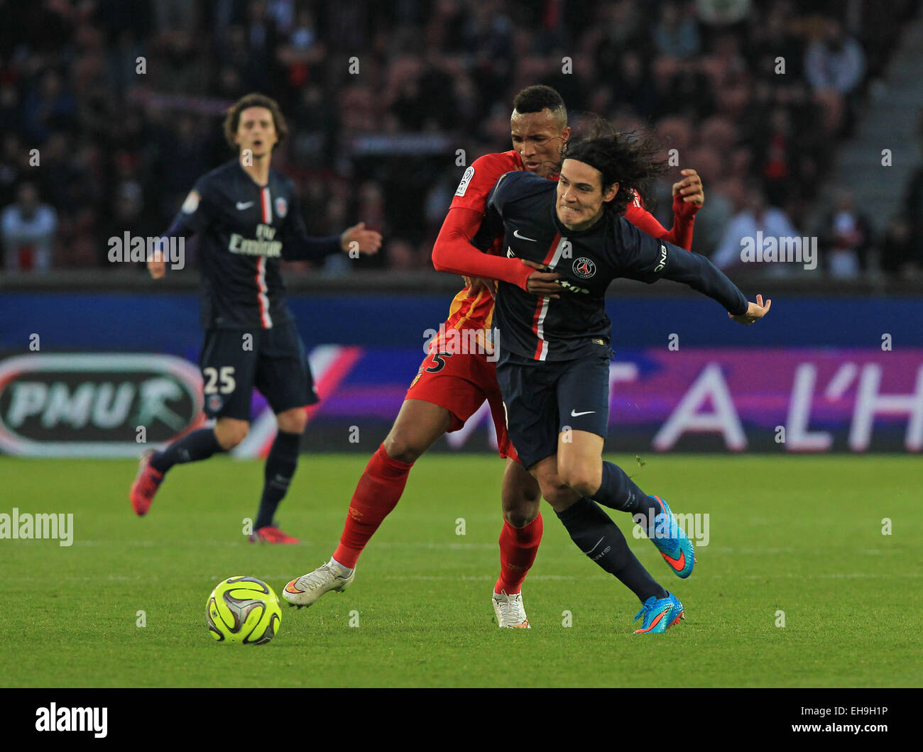 Football - France Ligue 1 - Edinson Cavani of Paris Saint-Germain tussles with Jean-Philippe Gbamin of Lens Stock Photo