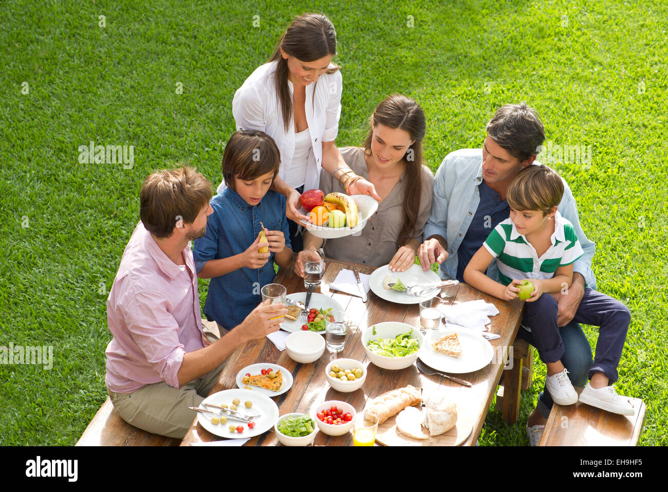 Family and friends gather for picnic Stock Photo