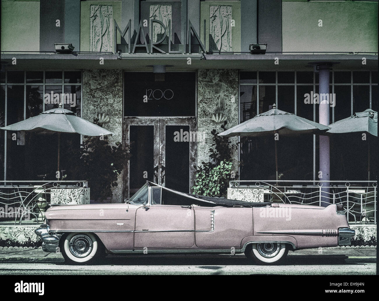 1956 Cadillac convertible parked outside hotel in Miami Stock Photo