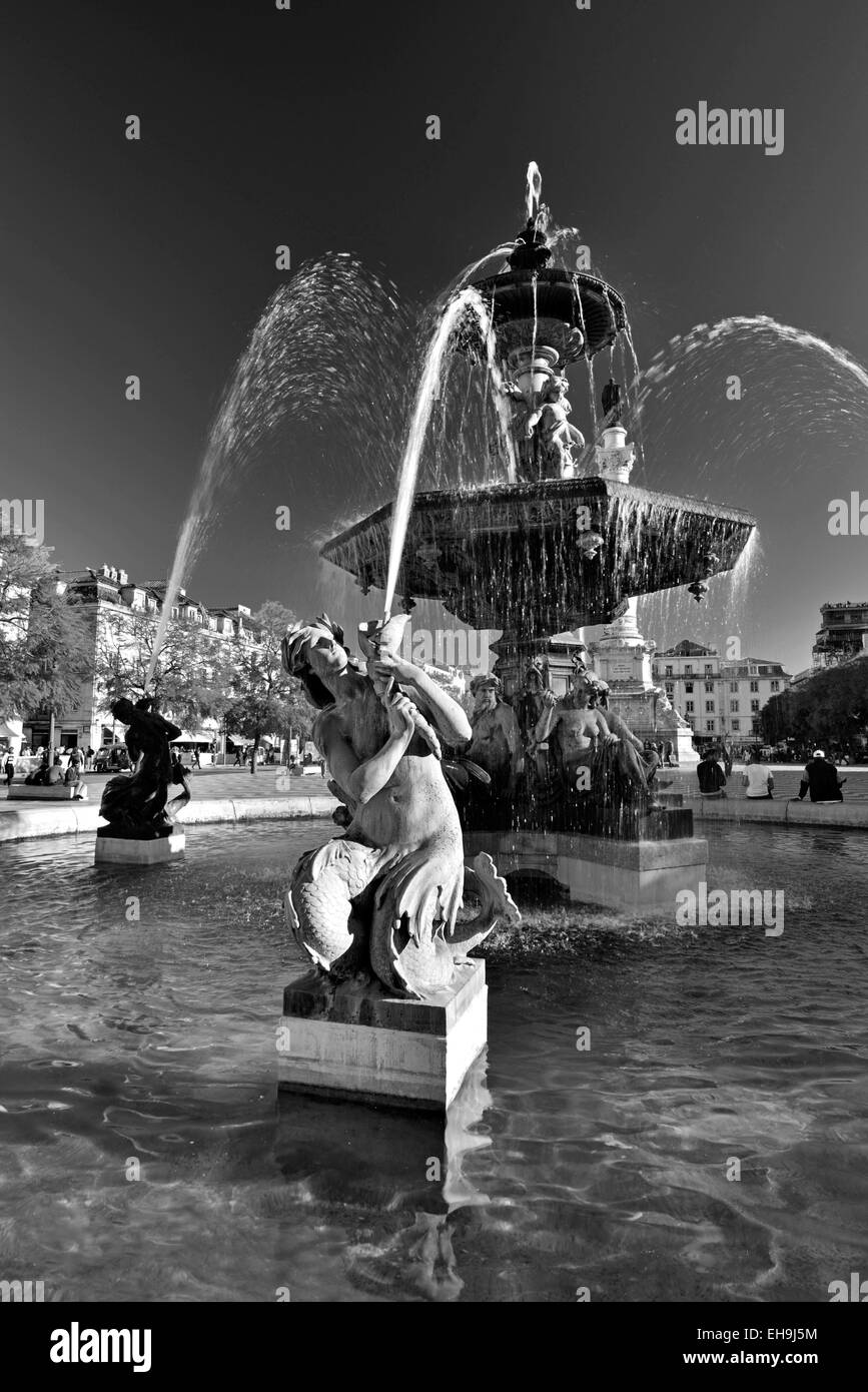 Portugal, Lisbon: Detail of a water fountain at Rossio ou Pedro IV Square in downtown in black and white version Stock Photo