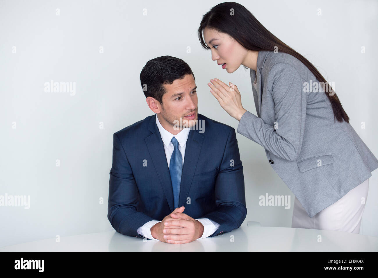 Woman delivering urgent message to executive Stock Photo - Alamy