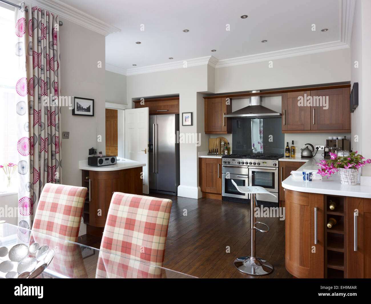 Brown and white kitchen in residential house, Kingsmead, UK Stock Photo
